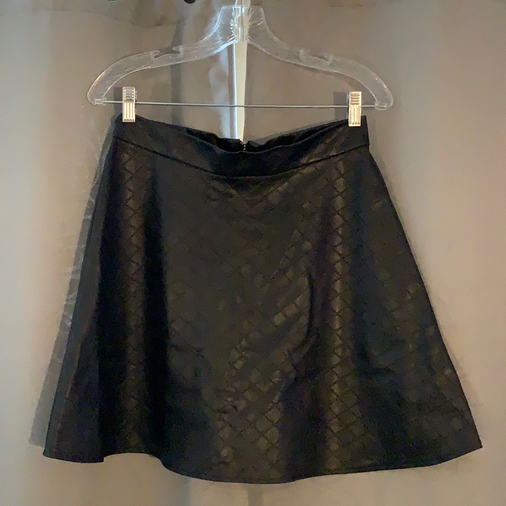 I’m selling my faux leather skirt, worn twice!